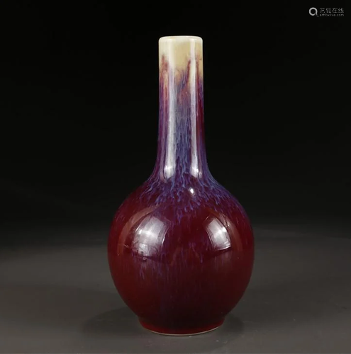 A TRANSMUTATION GLAZED LONG-NECK BOTTLE.