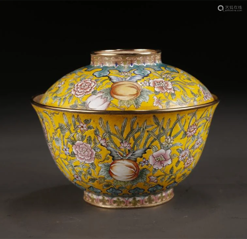 AN ENAMELED BRONZE BOWL WITH FLOWERS PATTERN.
