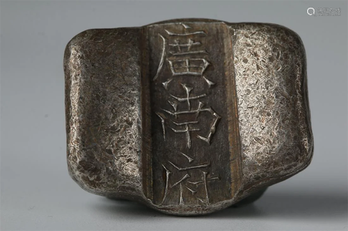 A SILVER INGOT, WITH LETTERING "GUANGNANFU".