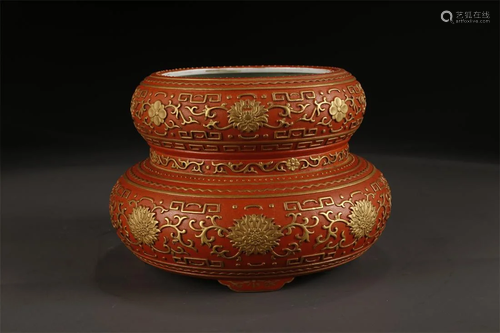 A CORAL-RED GLAZED PORCELAIN JAR.