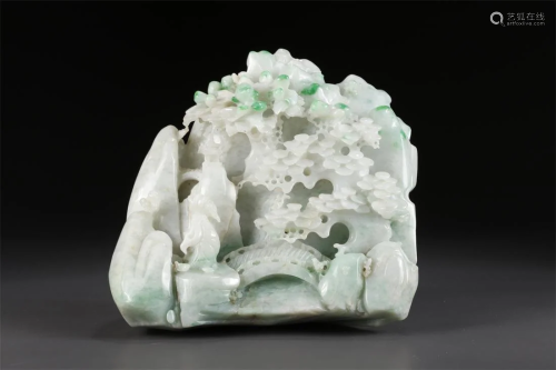 A JADEITE ROCKERY CARVING WITH PINE DESIGN.