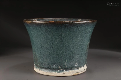 A LUJUN GLAZED PURPLE CLAY FLOWERPOT.