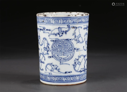 A BLUE-AND-WHITE PORCELAIN BRUSH POT.