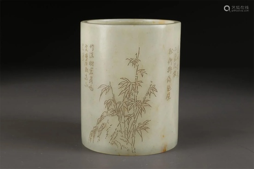 A HETIAN JADE BRUSH POT WITH PLANTS DESIGN.