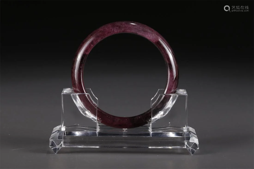 A TOURMALINE BANGLE.