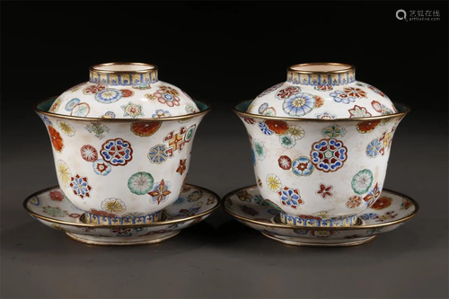 A PAIR OF ENAMELED BRONZE TEACUPS.