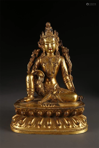 A TIBETAN AVALOKITESVARA BUDDHA STATUE.