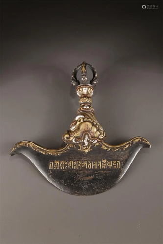 A TIBETAN CAST IRON VAJRA TOMAHAWK FOR RITE.