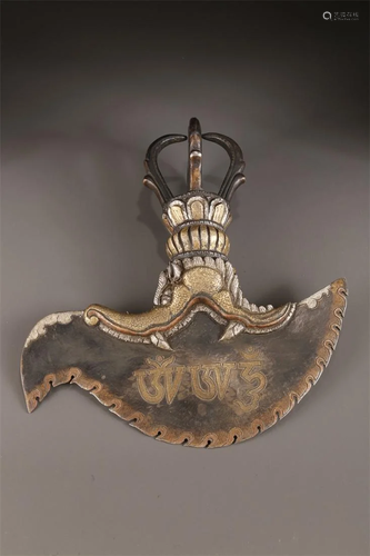 A TIBETAN CAST IRON VAJRA TOMAHAWK FOR RITE.