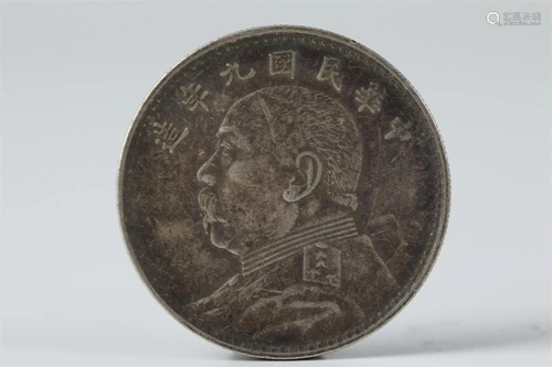 AN ONE-YUAN SILVER COIN.