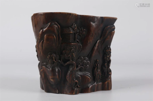 AN AGALWOOD BRUSH POT WITH FIGURE DESIGN.