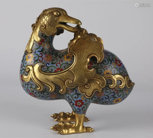 A CLOISONNE GILT BRONZE MANDARIN DUCK STATUE.