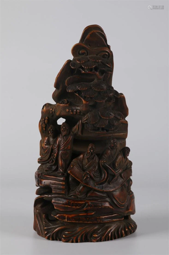 A BAMBOO FIGURE AND PINE CARVING ORNAMENT.