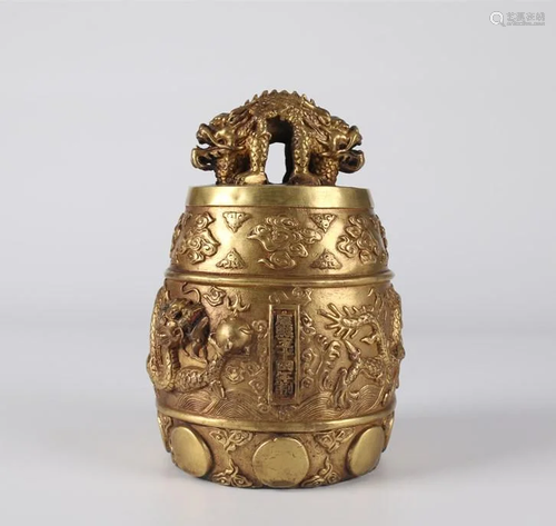 A GILT BRONZE BELL WITH CARVED DRAGON DESIGN.