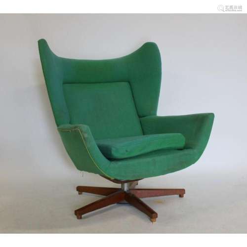 Midcentury Upholstered Wing Back Swivel Chair.