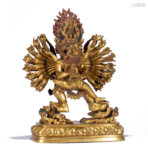 A TIBETAN GILT BRONZE YAMANTAKA