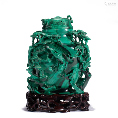 A CHINESE CARVED MALACHITE VASE WITH COVER