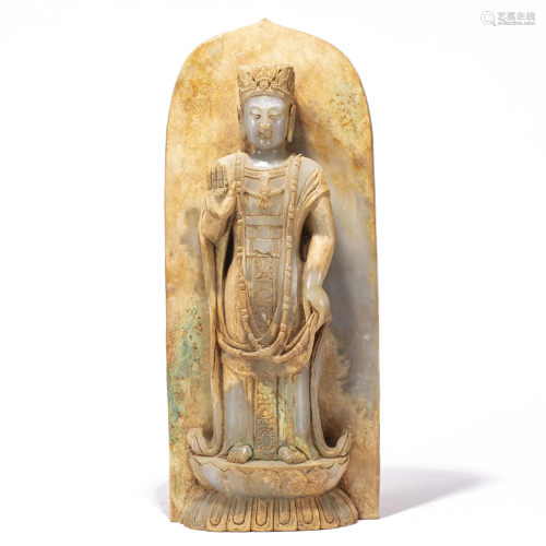 A CHINESE CARVED JADE STANDING BODHISATTVA