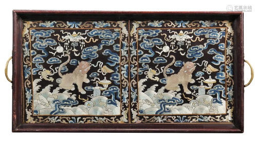 A CHINESE WOOD TRAY WITH SILK RANK BADGES