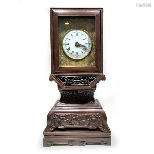 A CHINESE CARVED ROSEWOOD GILT MANTLE CLOCK
