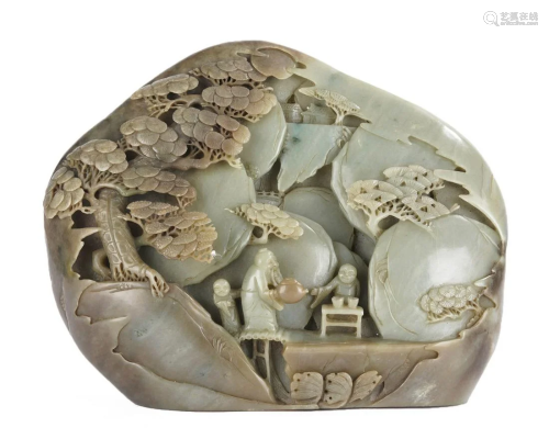 A CHINESE CARVED JADE MOUNTAIN BOULDER