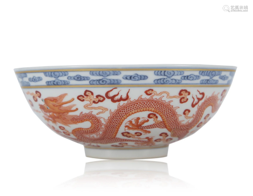 A CHINESE UNDERGLAZE BLUE AND IRON RED DRAGON BOWL