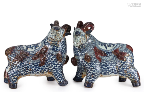 PAIR CHINESE UNDERGLAZE BLUE AND COPPER RED RAMS