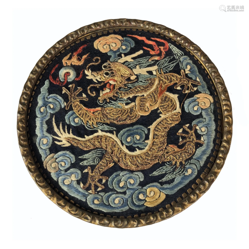 A FRAMED EMBROIDERED SILK 'DRAGON' ROUNDEL