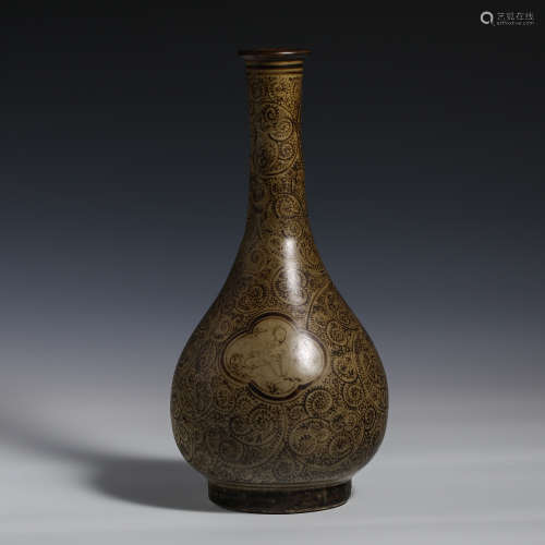 Chinese 10th century Cizhou kiln stick mallet bottle