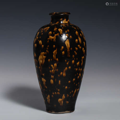 Chinese 10th century tortoiseshell glazed plum bottle