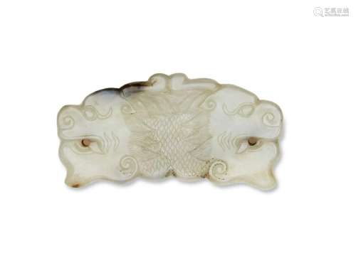 A WHITE AND RUSSET JADE 'DOUBLE-DRAGON' PENDANT CHINA, QING ...