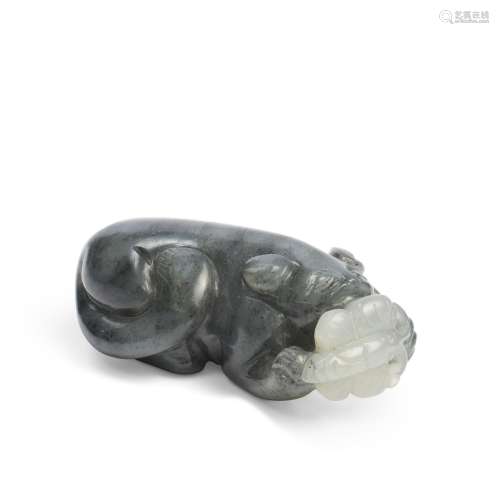A BLACK AND WHITE JADE ‘CAT AND BUTTERFLY’ GROUP CHINA, QING...