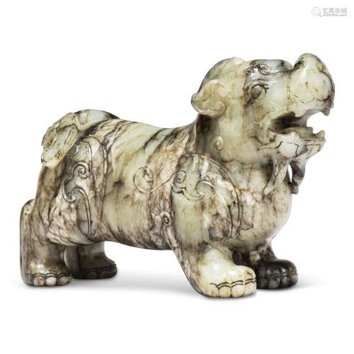 A MOTTLED WHITE AND GREY JADE MYTHICAL BEAST CHINA, 17TH-18T...