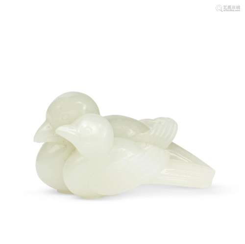 A WHITE JADE CARVING OF TWO MAGPIES CHINA, QING DYNASTY, 18T...
