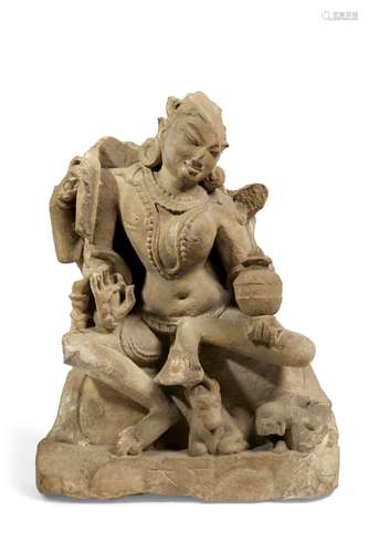 A SANDSTONE FIGURE OF ARDHANARISHVARA  CENTRAL INDIA, 11TH C...