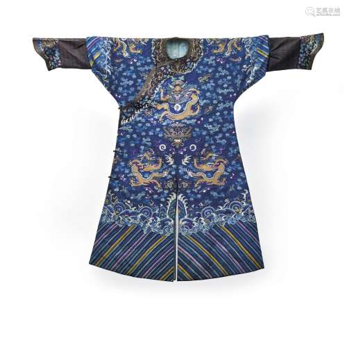 A BLUE-GROUND EMBROIDERED SILK ROBE, LONGPAO CHINA, QING DYN...