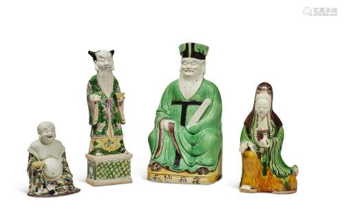 A GROUP OF FOUR FAMILLE VERTE BISCUIT FIGURES CHINA, QING DY...