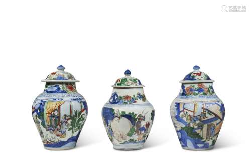 TWO WUCAI 'FIGURAL' BALUSTER JARS AND COVERS AND A WUCAI 'EL...