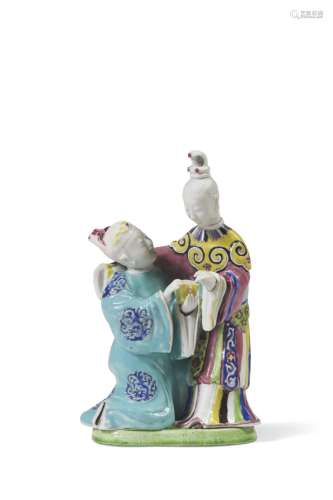 A FAMILLE ROSE GROUP OF A COUPLE CHINA, QING DYNASTY, QIANLO...