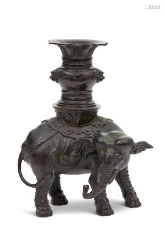 A BRONZE MODEL OF AN ELEPHANT AND VASE CHINA, 17TH-18TH CENT...