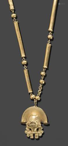 Collier en or jaune articule, alterne de rouleaux et perles ...