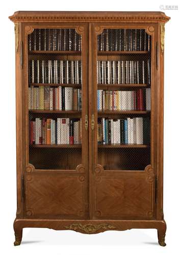 Bibliothèque en bois de placage et marqueterie à décor géomé...