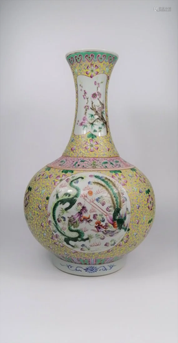 A Chinese yellow ground famille rose vase