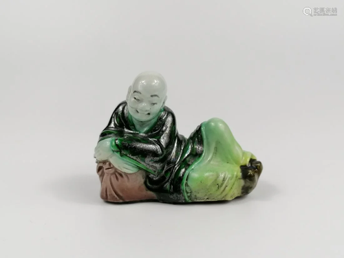 A Chinese Sancai porcelain monk brush rest