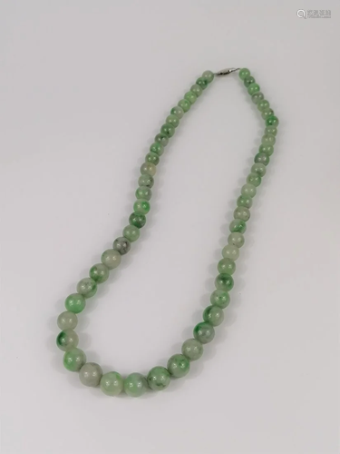 A Chinese emerald jade necklace