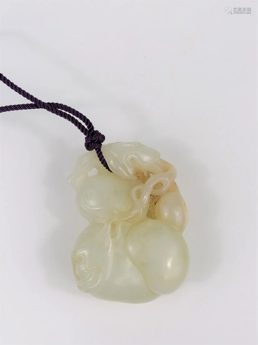 A Chinese white jade pendant