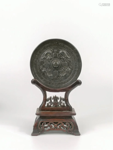 A Chinese bronze mirror