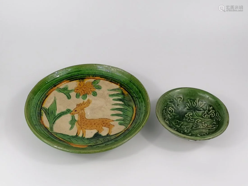 A CHINESE SANCAI-GLAZED 'DEER' DISH AND A GREEN-GL...