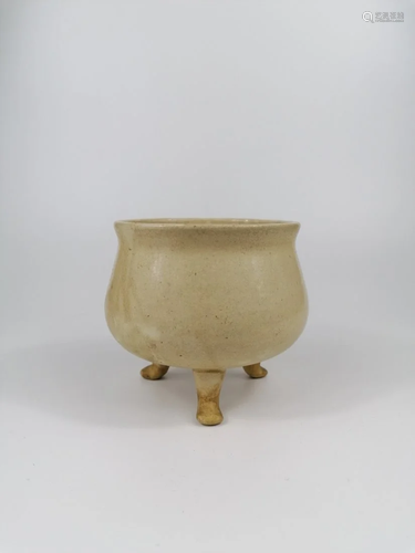 A Chinese white glaze tripod censer