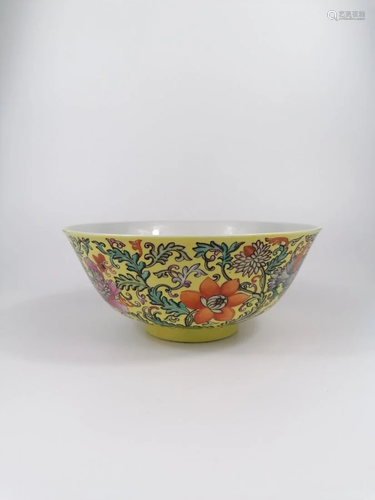 A Chinese Yellow ground famille rose bowl